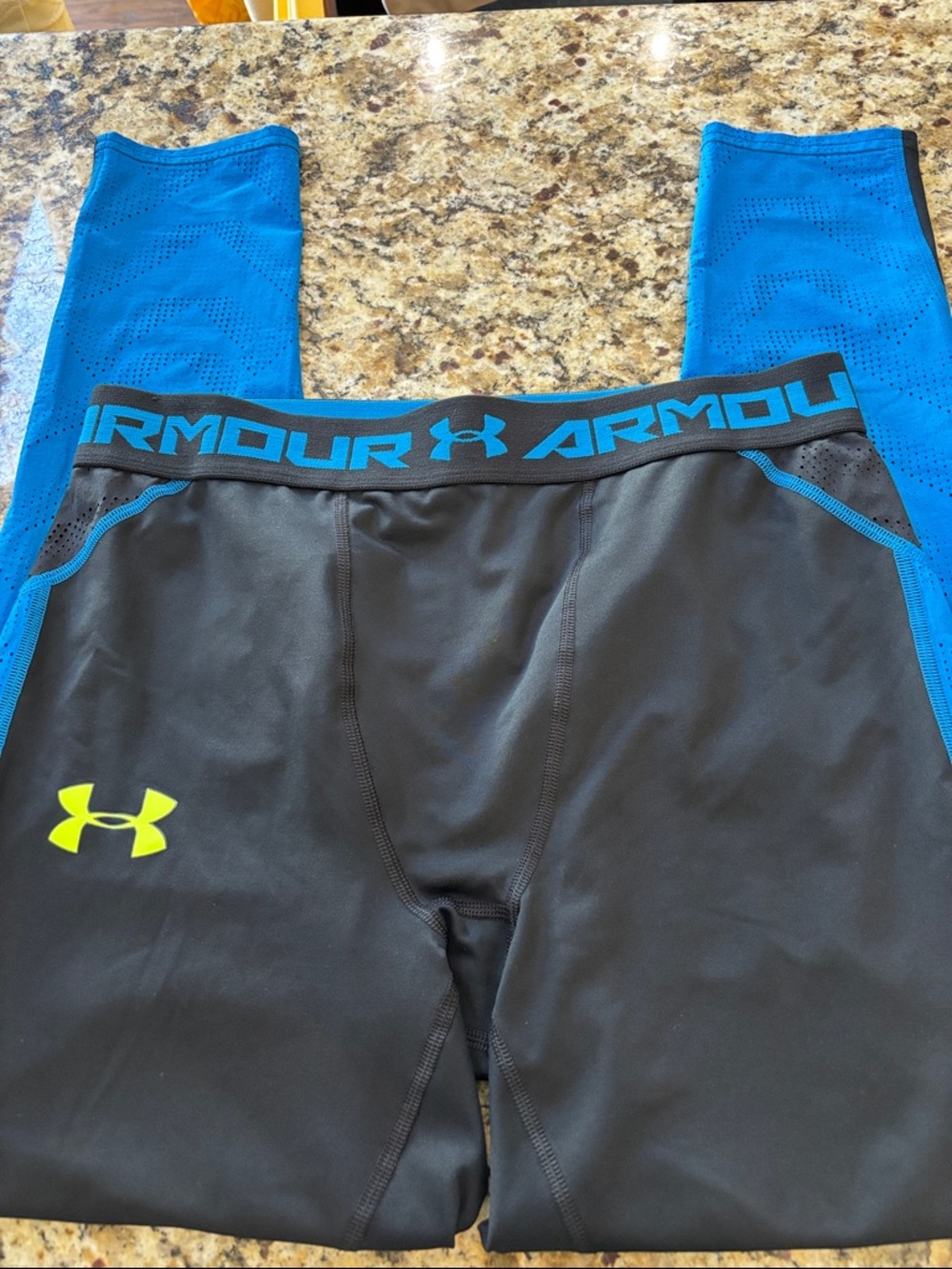 Under Armour Black Compression leggings with Blue Trim and Neon Yellow Logo